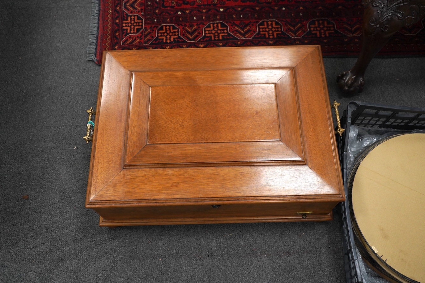 A walnut cased Orphenion, the replacement case is understood to have been constructed from panels from RMS Mauretania, 64cm wide, 49cm deep, 23cm high, with twenty-two 41cm diameter discs. Condition - good.